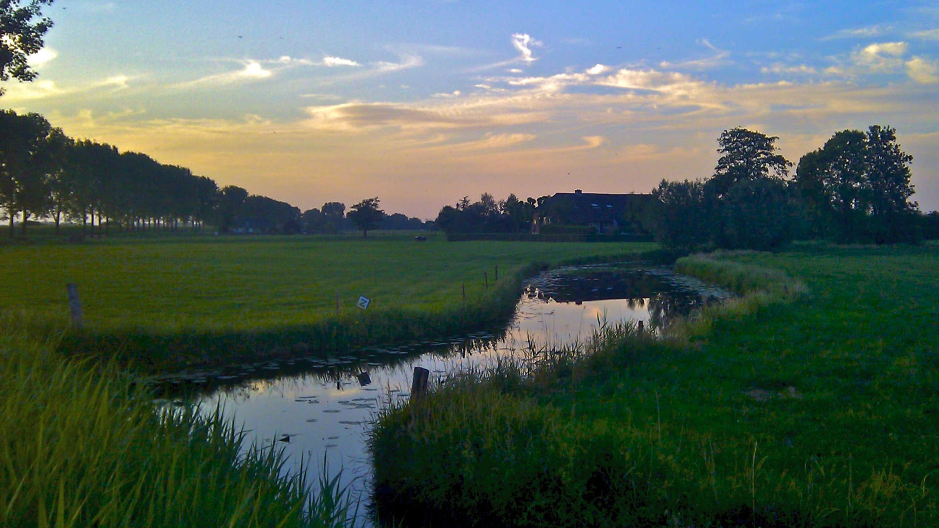 gestolen uurtje zonsondergang de velde sloot